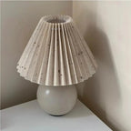 Ceramic Table Lamp with Folded Shade Warm Ambient Lighting