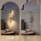 Silver LED spiral wall light illuminated