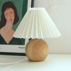 Ceramic Table Lamp with Folded Shade Warm Ambient Lighting